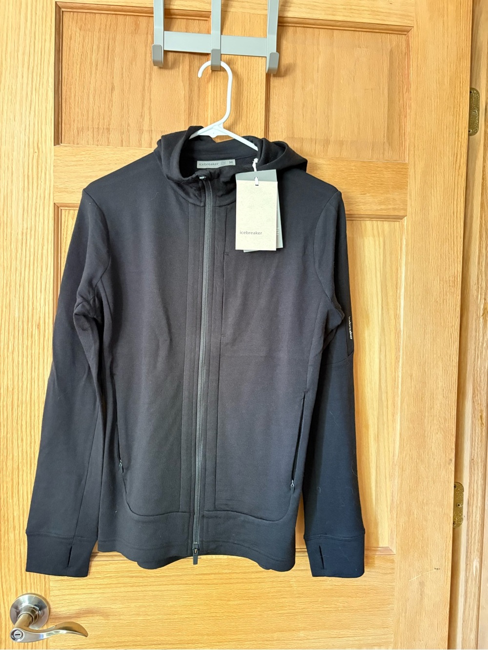 Icebreaker 100% merino wool. 
Women's Black Quantum Hoodie NWT